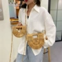 手提新款编织镂空女包