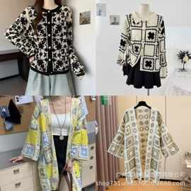 设计感撞色镂空翻领长袖针织衫女秋季小众减龄单排扣别致上衣