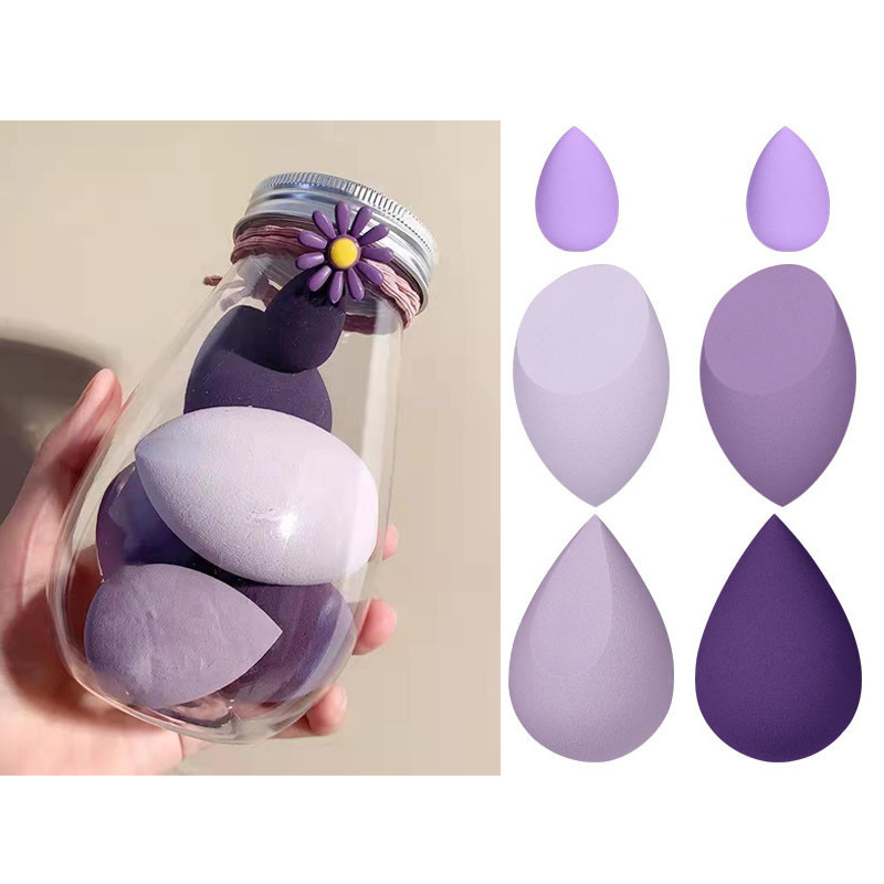 Traje de viaje portátil polvo puff PET embotellada belleza huevo súper suave embotellada mejorada esponja polvo puff leche té enlatado color