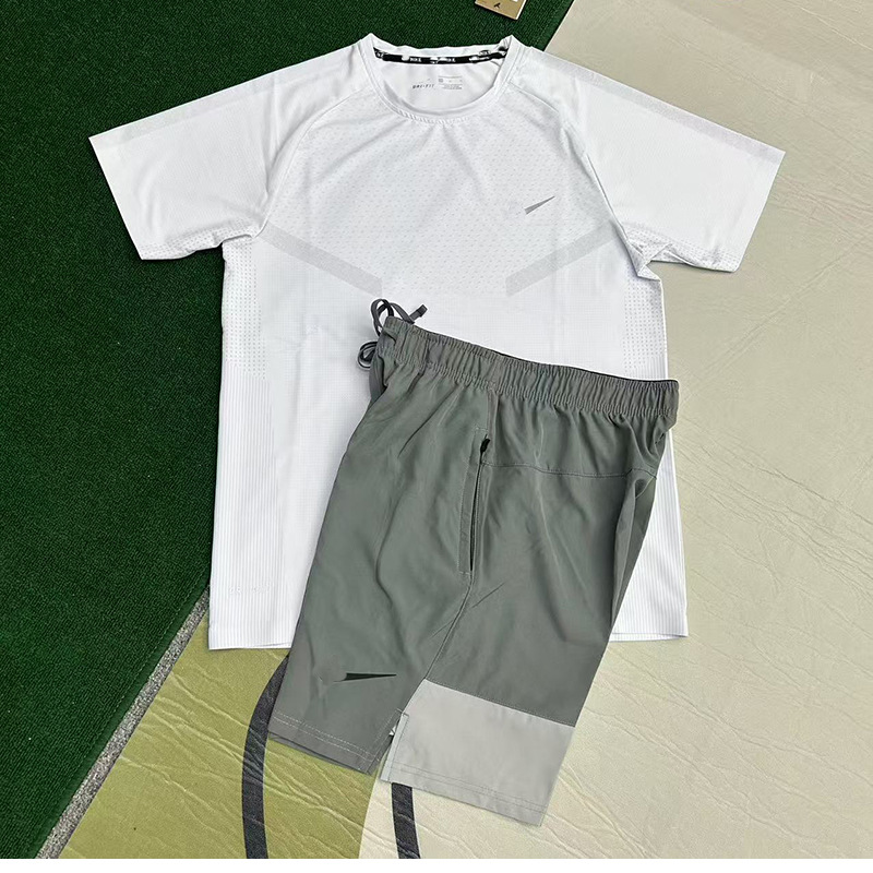 Nuevo al por mayor movimiento de secado rápido transpirable hombre camiseta de manga corta entrenamiento de hielo suelta chaqueta casual fitness correr