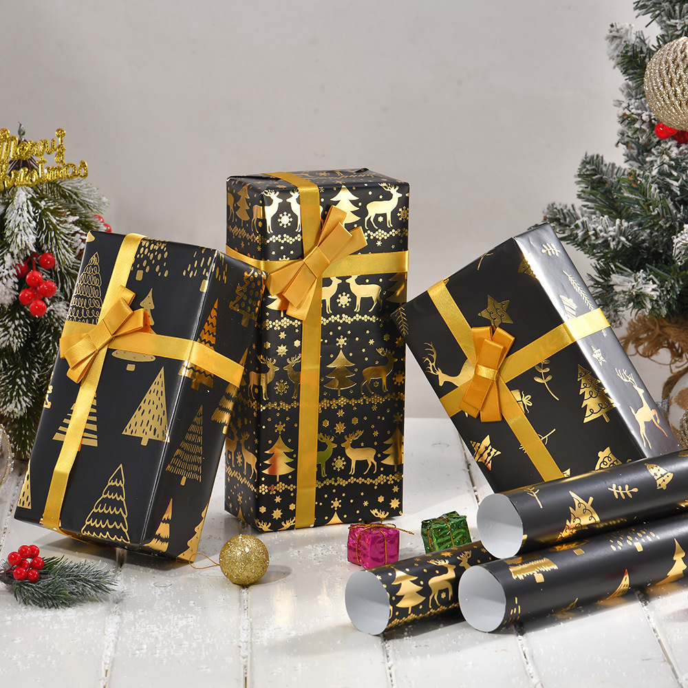 Nuevo papel de embalaje de Navidad estampado retro oro negro alce copo de nieve regalos de árbol de Navidad papel de regalo al por mayor