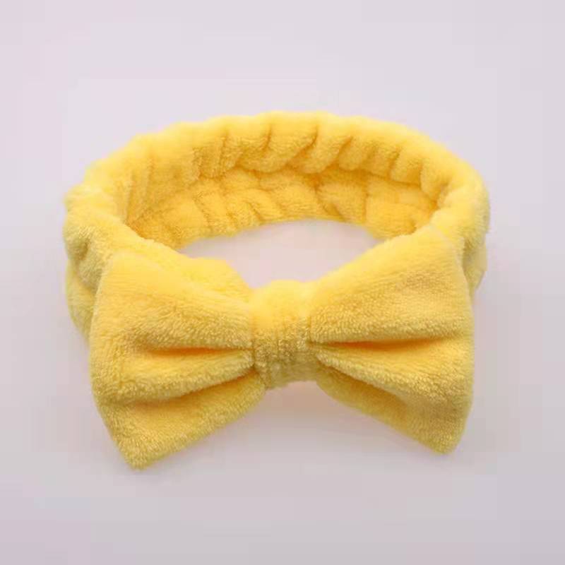Coral hairgrip with bow