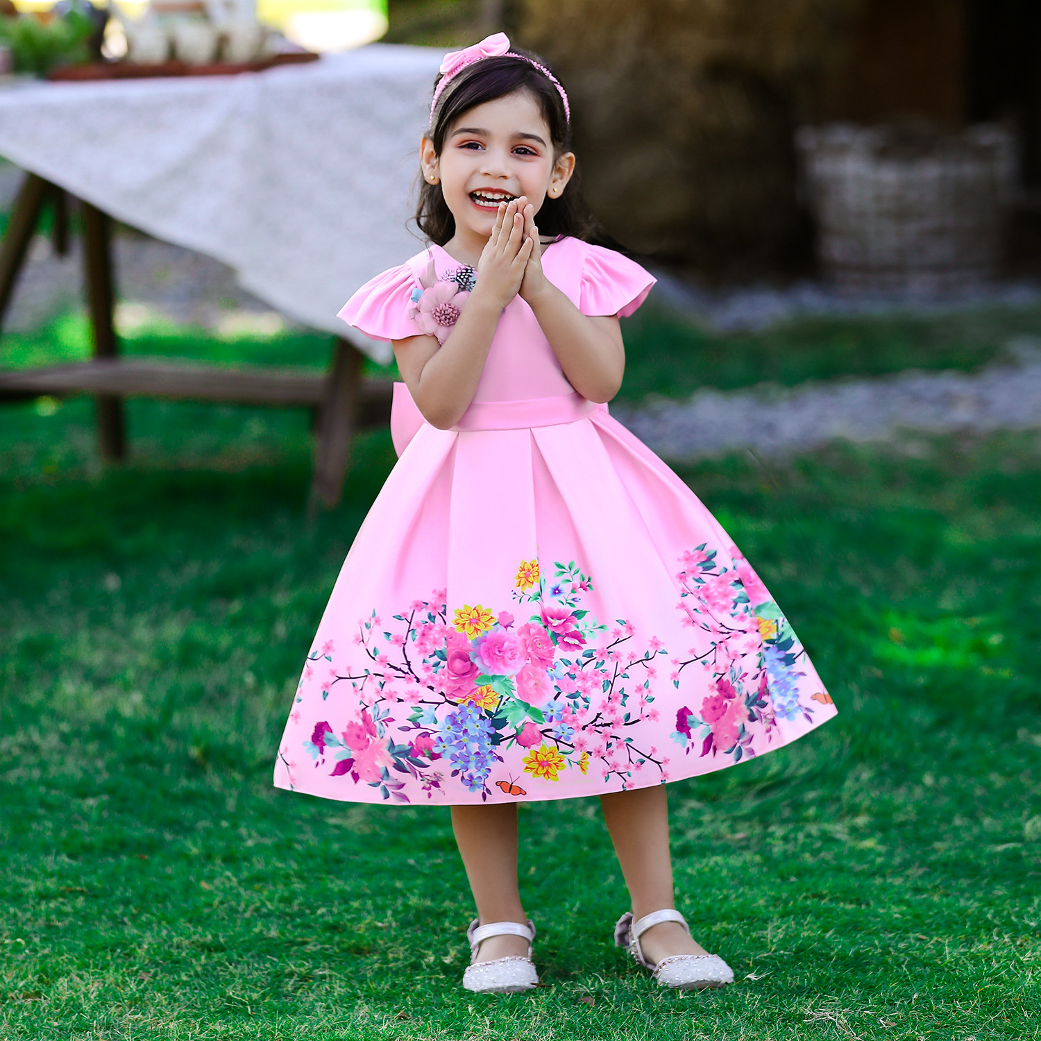 Nuevo vestido de los niños europeos y americanos impreso tela forjada arco bebé niña cumpleaños princesa vestido origen suministro