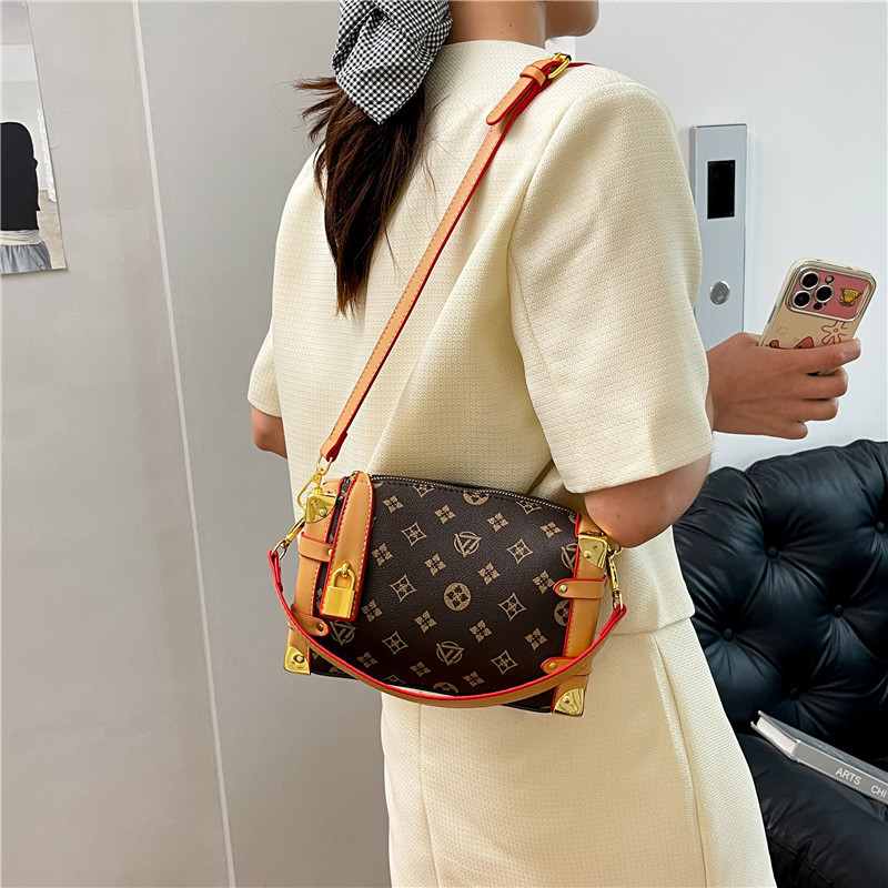 Bolso de textura transfronteriza 2025 verano nuevo bolso femenino diseño de nicho bolso de hombro bolso de mensajero de color de contraste retro marea