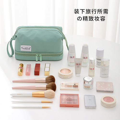 New double-layer cosmetic bag with large capacity and good looks, portable women's storage bag, Internet celebrity hand-held toiletry bag wholesale