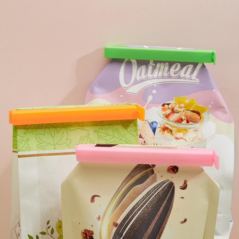 Clips de sellado de alimentos del fabricante, clips a prueba de humedad y para mantener la frescura para té, leche en polvo, refrigerios, bolsas de alimentos, clips de sellado de plástico con logotipo personalizado.