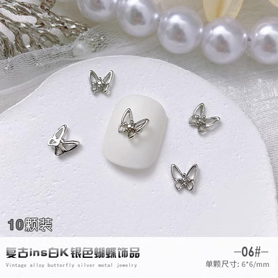 2023 Internet Celebrity nueva aleación de uñas joyería vintage blanco K serie aleación mariposa joyería accesorios de aleación