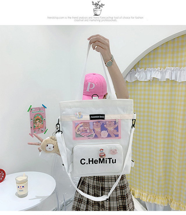 Korean-style canvas bag for girls with one shoulder, in the style of Harajuku, ulzzang, with a large capacity and contrasting colors, is a crossbody hand-held schoolbag for classes undefined