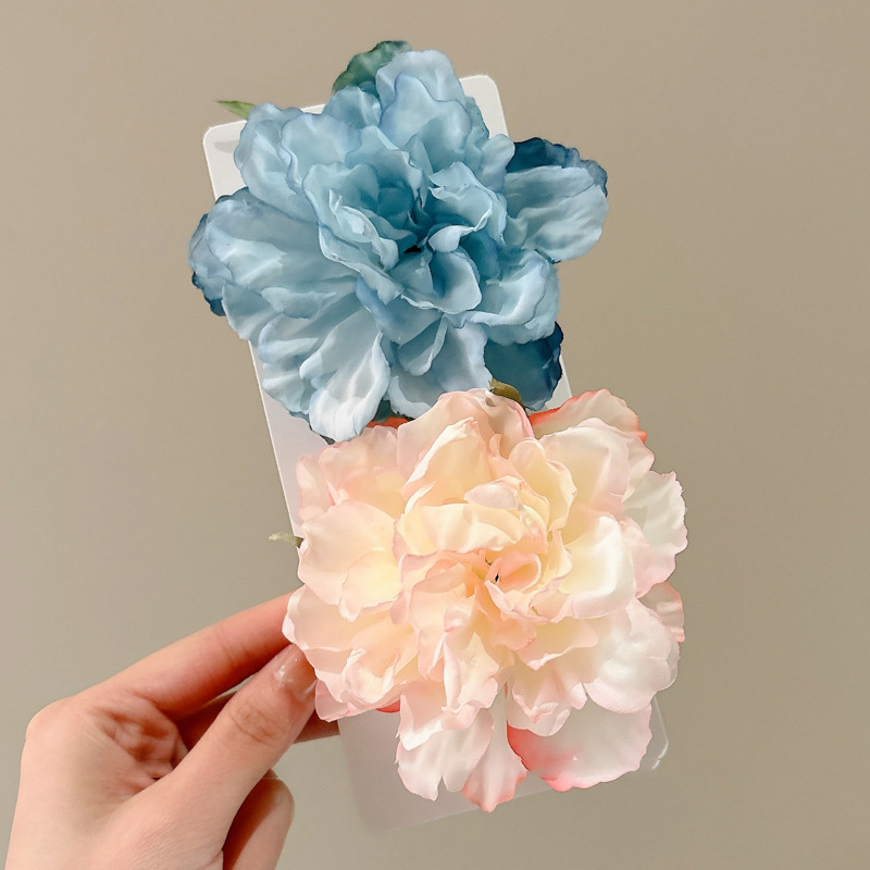 2025 brota de cabello en línea sensación de alto nivel rosa boca de pato mar de cabello cortado bordes de cabello clip de cabello flores adornamiento de cabello mujer