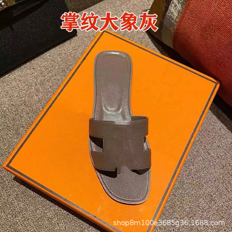 鼎羊皮の新型真皮平底ネット赤同タイプのスリッパ女性夏外着一字引きビーチカジュアル太さと涼しさ引き