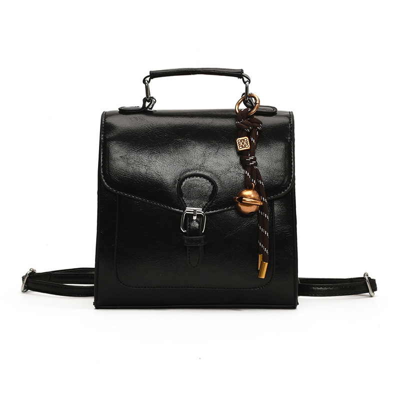 2025 nuevo estilo de moda de piel de cera de aceite de gran capacidad bolsa de viaje mochila multifuncional mochila de hombro color sólido