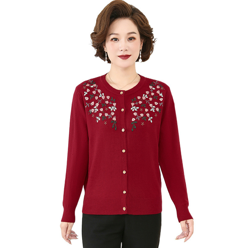 Thin knitted sweater with a round collar