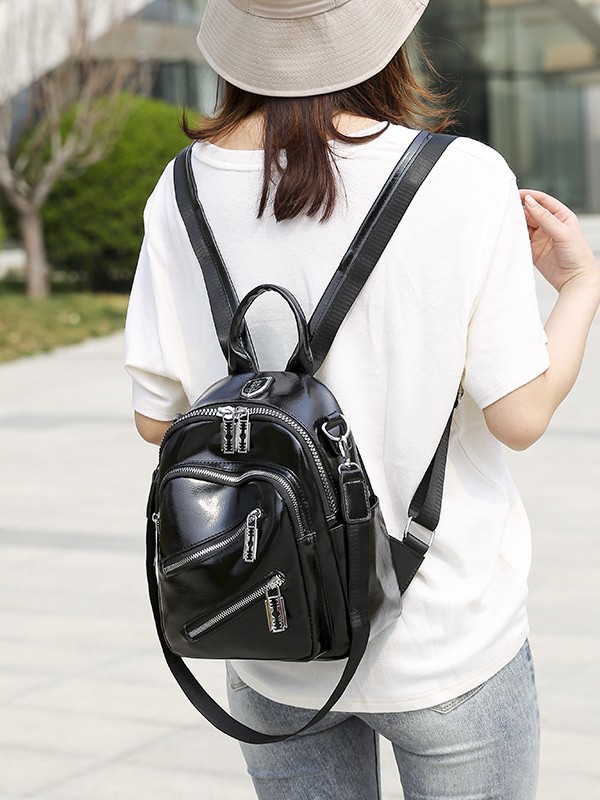 Bolsa multifuncional para mujeres 2025 nuevo tipo de pu suave verdadero retro al aire libre bolsa de viaje de viaje de viaje de viaje casual versátil mochila de mujer