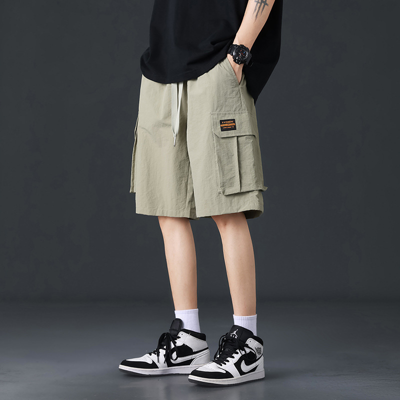 Pantalones cortos de trabajo de seda de hielo para hombres de verano delgados estilo de moda versátil vientos de puerto pantalones casuales deportivos sueltos