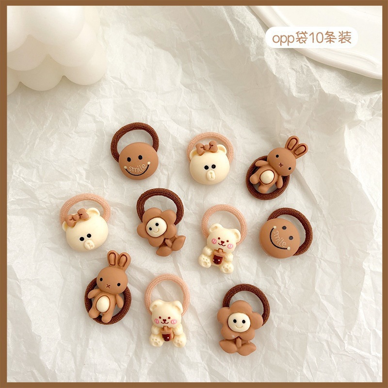 La banda de goma marrón leche simple y Linda para las mujeres no duele la banda del pelo de la cuerda del pelo de la cola de caballo del tamaño pequeño para las mujeres