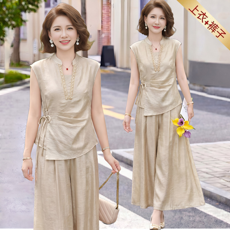 Fashionable Wide-Leg Pants Set for Women, Summer 2026, New Age-Reducing Style, Loose-Fitting Elegant Top, High-End Two-Piece Set for Moms Fashionable Wide-Leg Pants Set for Women, Summer 2026, New Age-Reducing Style, Loose-Fitting Elegant Top, High-End Two-Piece Set for Moms