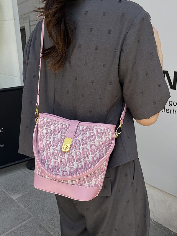 Bolso de mano exquisito de alta gama para mujer 2025 nuevo bolso de cubo retro con estampado de tela bolsa de mensajero de un solo hombro de nicho