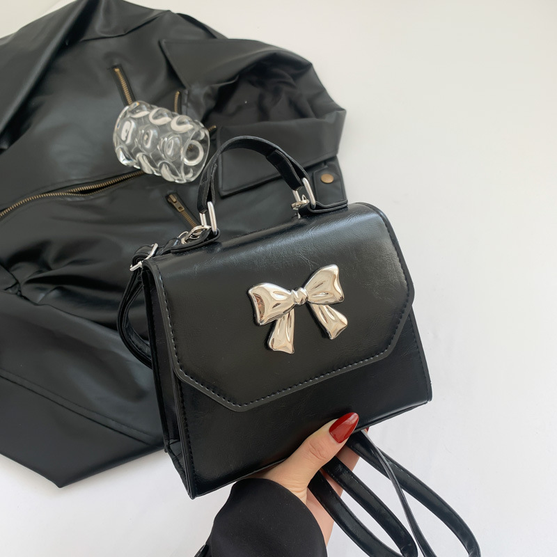 2025 nuevo estilo francés personalidad mochila de hombro de mujer alta sensación de moda simple de hombro de mano pequeña bolsa de mano coreana