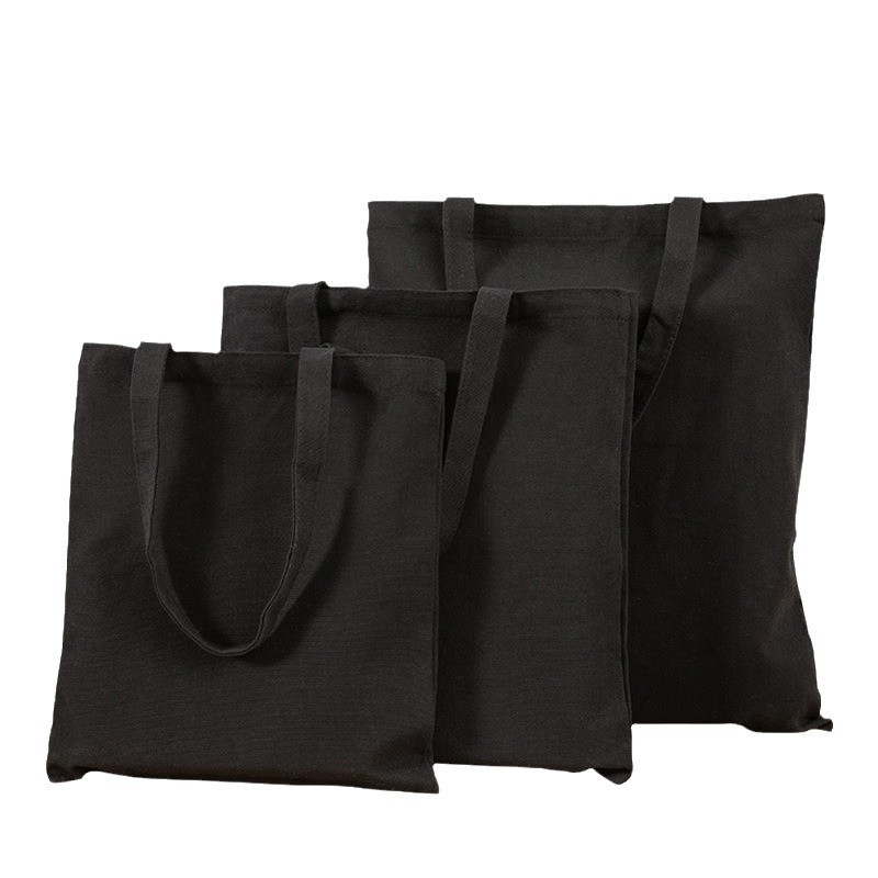 Bolsa de lona pequeña negra simple de las mujeres en stock bolsa de lona portátil en blanco Fábrica crossbody estudiante publicidad artística de un solo hombro