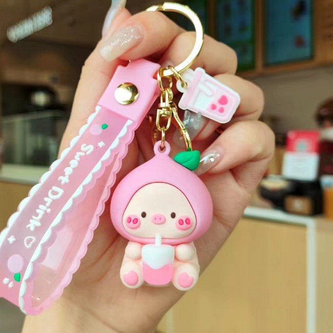 Muñeca de dibujos animados goteo llavero bolsas escolares exquisitas para hombres y mujeres colgantes para agarrar muñecas colgantes para el mercado nocturno regalos al por mayor