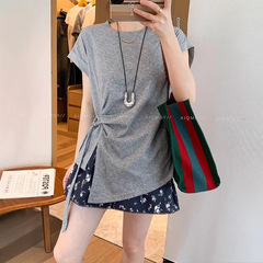 ソリッドカラーラウンドネック半袖不規則なスリットTシャツ女性用2025夏の新しいスタイルのレースアップファッショナブルなスリムトップ