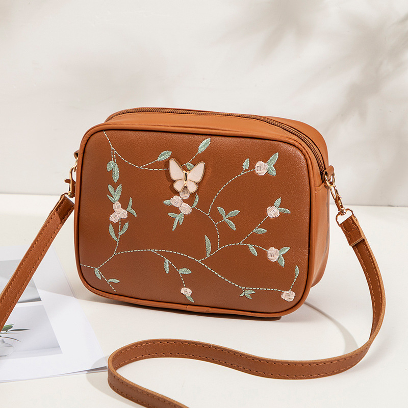 Bolsas de cámara de hombro de moda de mariposa decoración 2024 bolsas de mujer verano y otoño nuevo estilo de personalidad de bolsas de cambio inclinadas