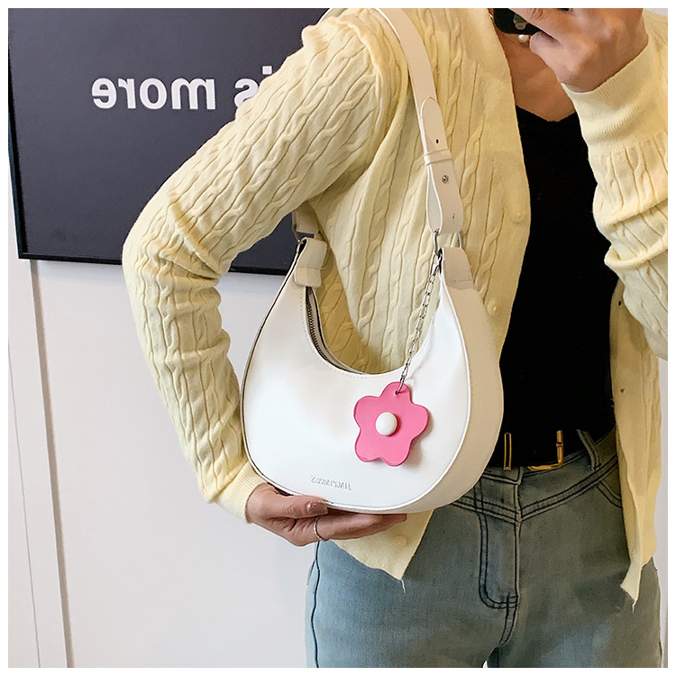 Cross-border women's bag 2024 New style, trendy texture, versatile, ins fashion single-shoulder armpit bag, small flower pendant, crescent moon bag undefined