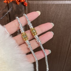 999足の銀の黄財神は手を巻いて女性の古法の女性のカップルの本命年のクリスマスのプレゼントを刺して彼女の妻に送ります。