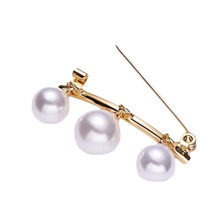 Broche de perlas anti-exposición transfronteriza brillante perla pin bufanda de seda hebilla pin broche fijo cintura adelgazante artefacto