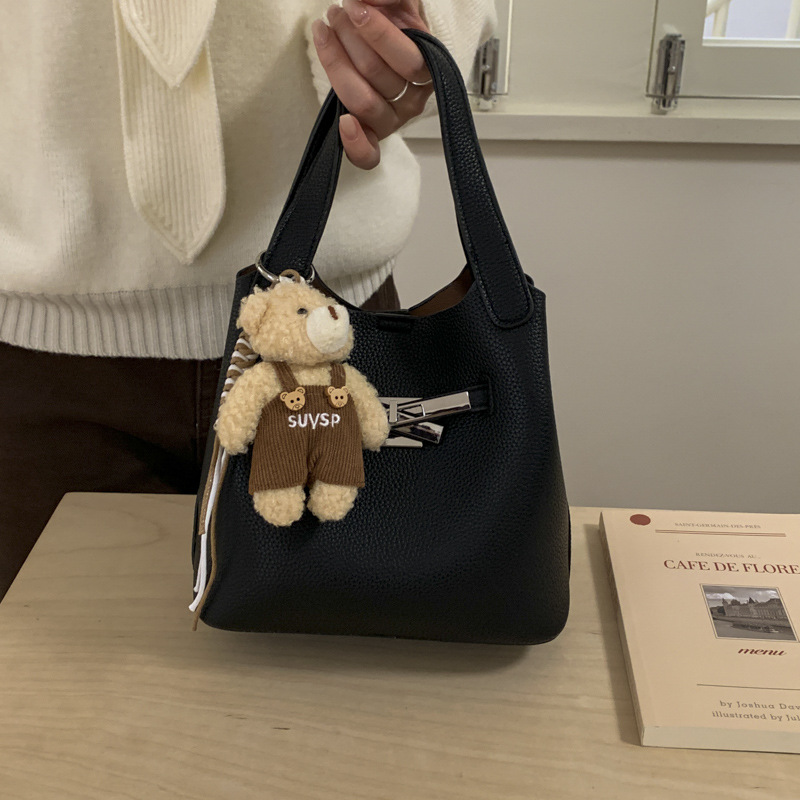 Bolsa de viaje coreana para niños y madres, bolso de balde de mano de mujer de alto nivel, bolso de lichi transfronterizo, bolso de Kelly, bolso de hombro