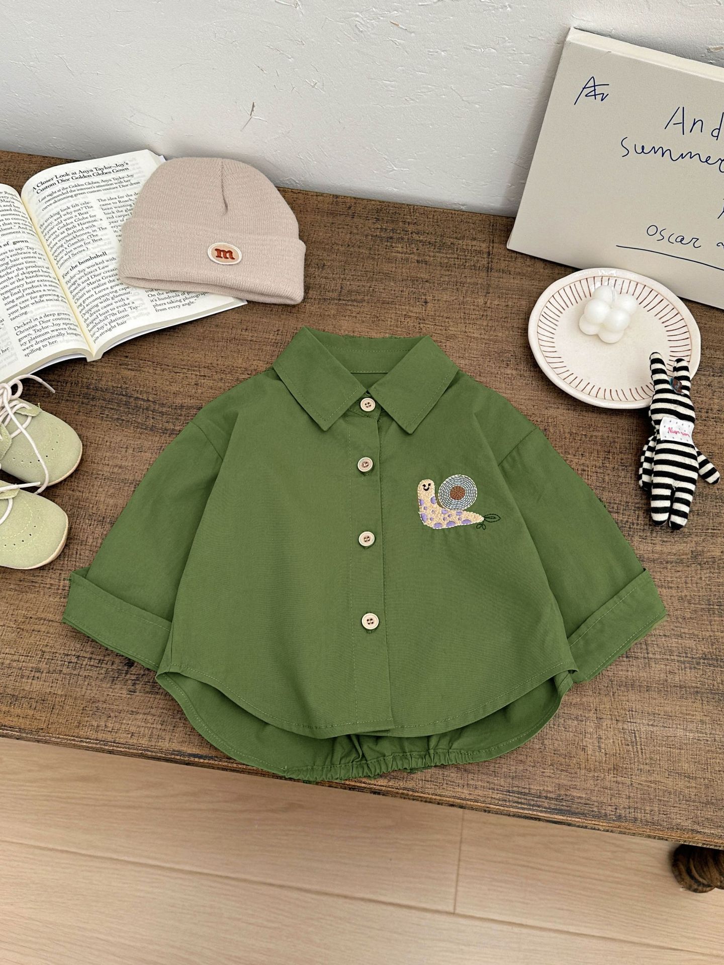 Ropa de bebé coreana 2026 nuevo bebé guapo camisa de algodón puro otoño impresión coreana de camisa de manga larga para niños