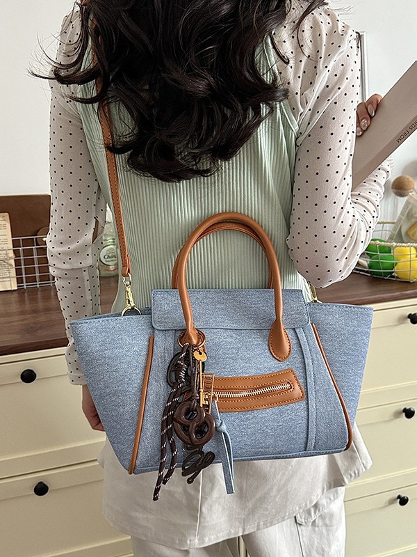 Bolso para mujeres 2026 comercio exterior nuevo bolso de mano de gran capacidad de alta calidad color contraste commuting cara sonriente bolso de mochila