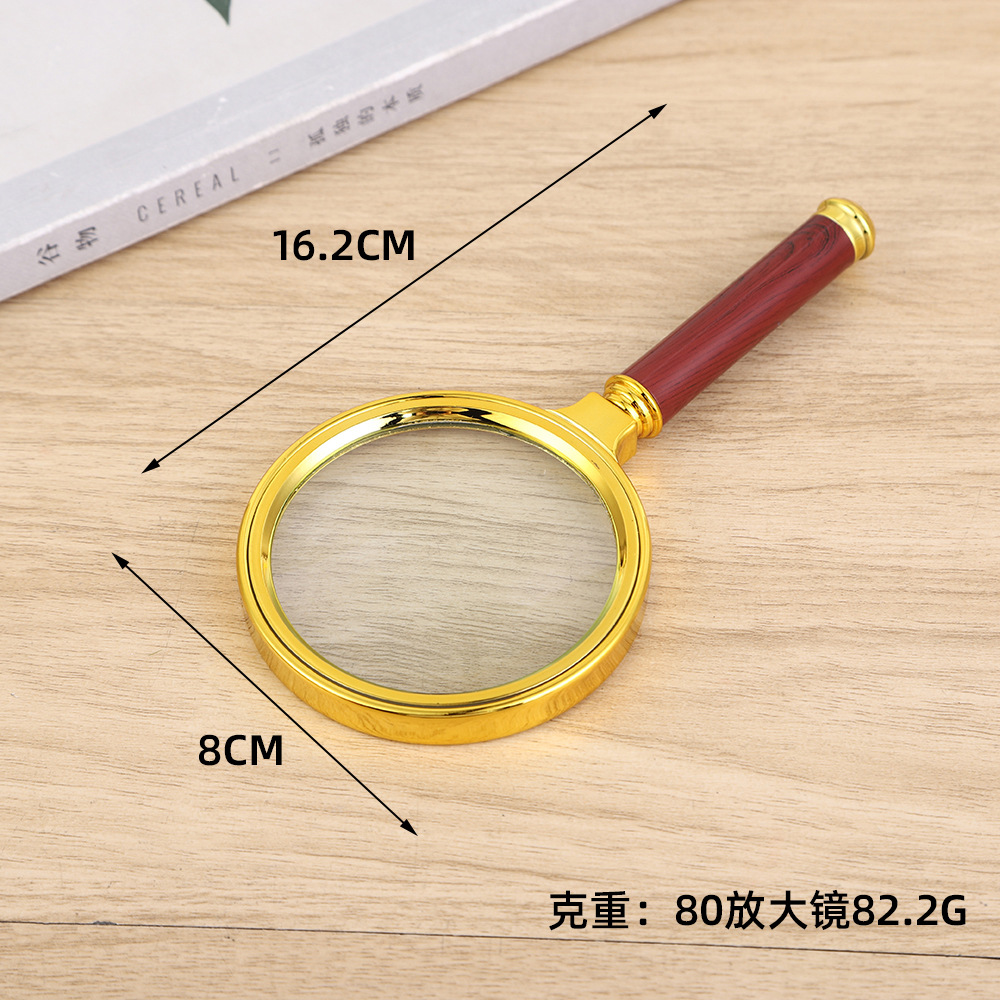 Lupa mano portátil HD, mango imitación rosa chapado oro, lectura grano madera, venta al por mayor.