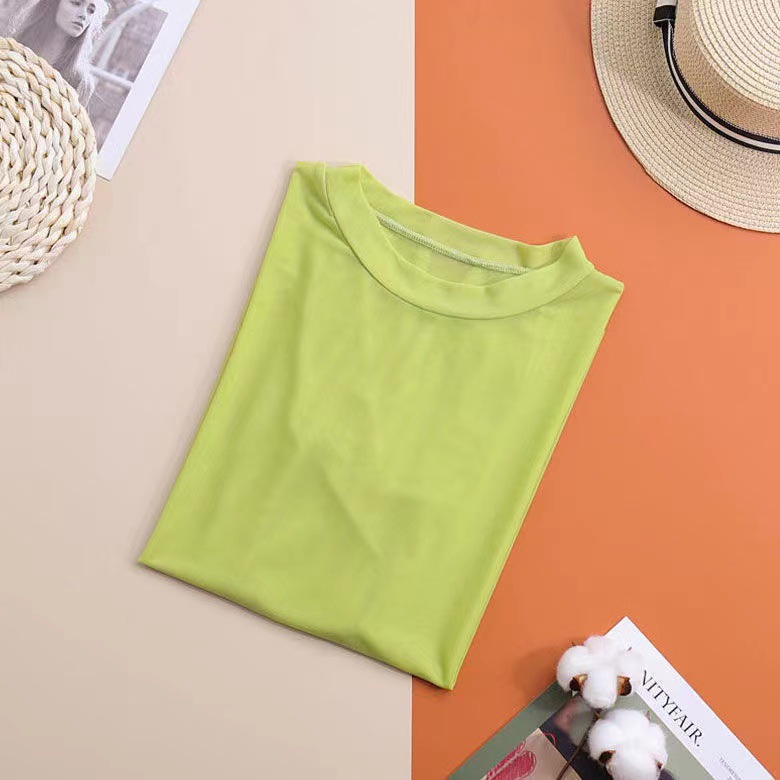 Verano nueva manzana verde delgada manga larga Camiseta para las mujeres Ropa de protección solar transparente de color caramelo de malla de seda de hielo 2024