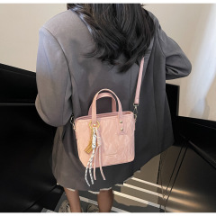 女性用のシンプルで多用途なハンドキャリーバケットバッグ、新しい韓国スタイルのトレンディなファッションショルダーバッグ、Douyinカジュアルクロスボディバッグ