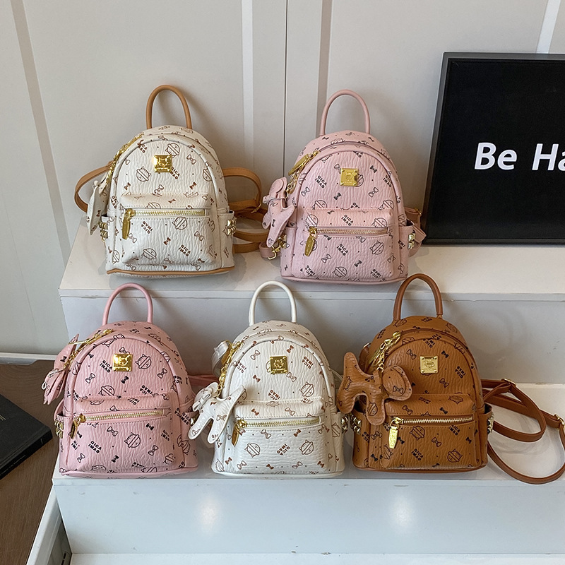 2025 nueva mochila transfronteriza gato de dibujos animados pequeño y ligero mochila diaria para niñas bolso de estudiante de viaje lindo
