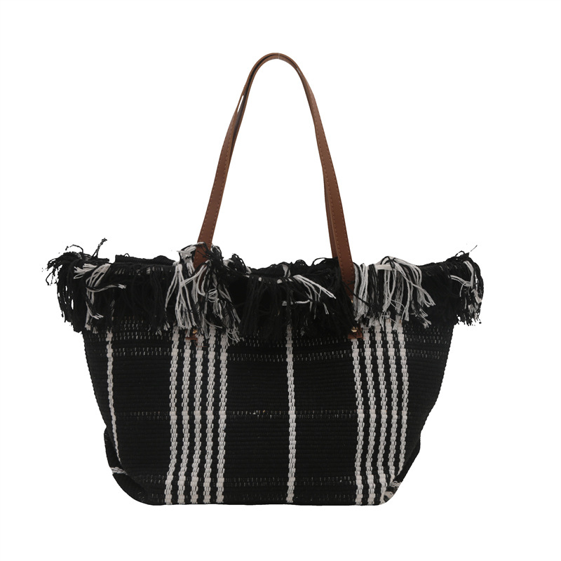 2024 nuevo bolso de tote de lona de cercanías de gran capacidad de moda con borlas de un solo hombro bolso tejido de todo fósforo bolso de lona