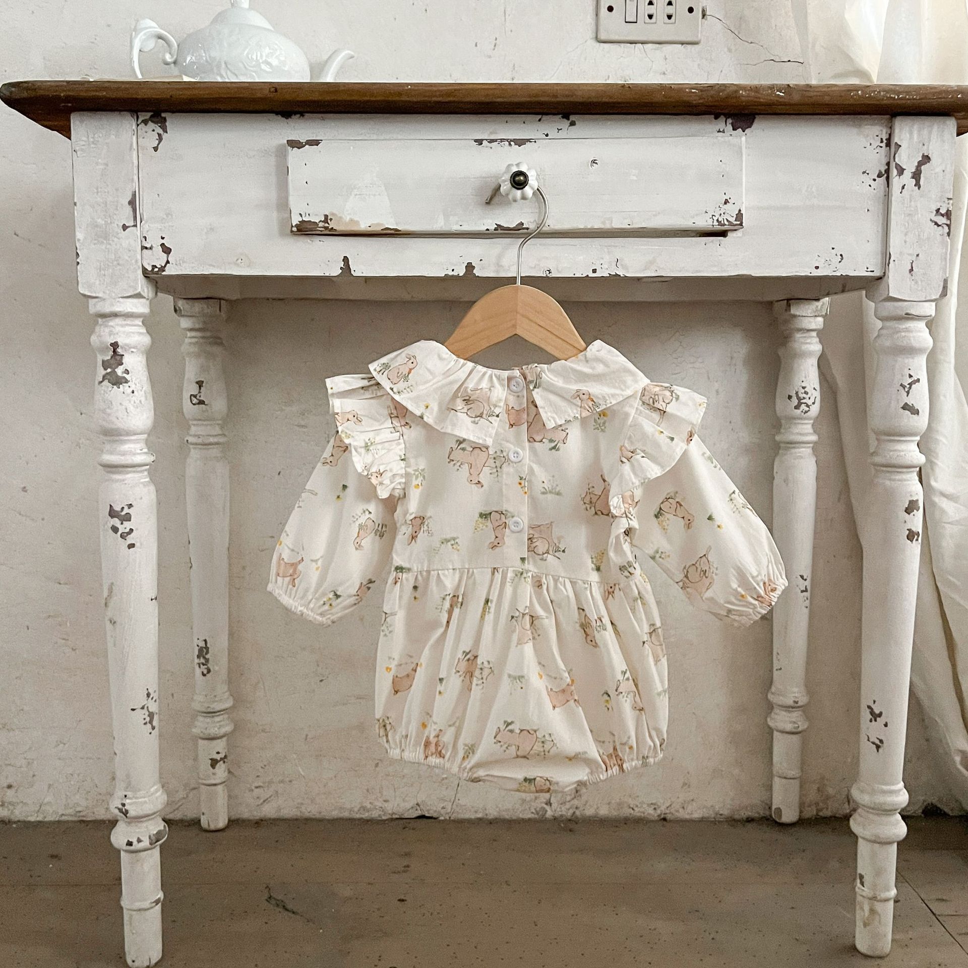 INS estilo coreano bebé de algodón plegable conejo impreso volando manga mameluco recién nacido suelta mono mameluco