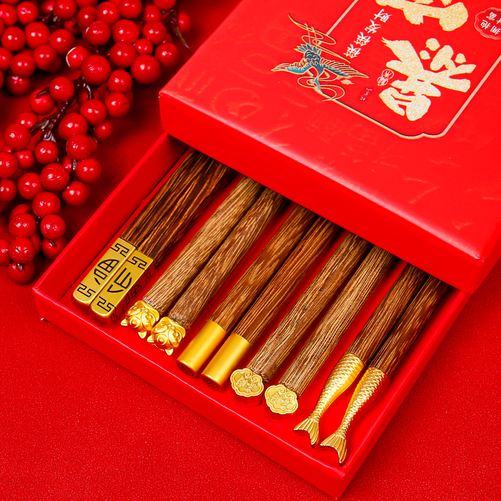 Palillos de Año Nuevo Palillos de madera de ala de pollo Palillos de madera maciza sin pintura y sin cera Comidas domésticas Una persona, una persona, palillos, caja de regalo para la riqueza