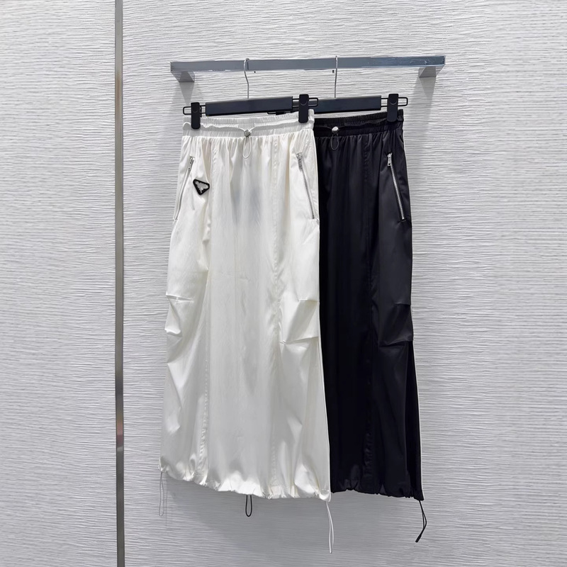 Nanyou 26 stylish long skirt with back slit, pleats, side stripes, elastic waist, drawstring, pockets, and workwear style Nanyou 26 stylish long skirt with back slit, pleats, side stripes, elastic waist, drawstring, pockets, and workwear style