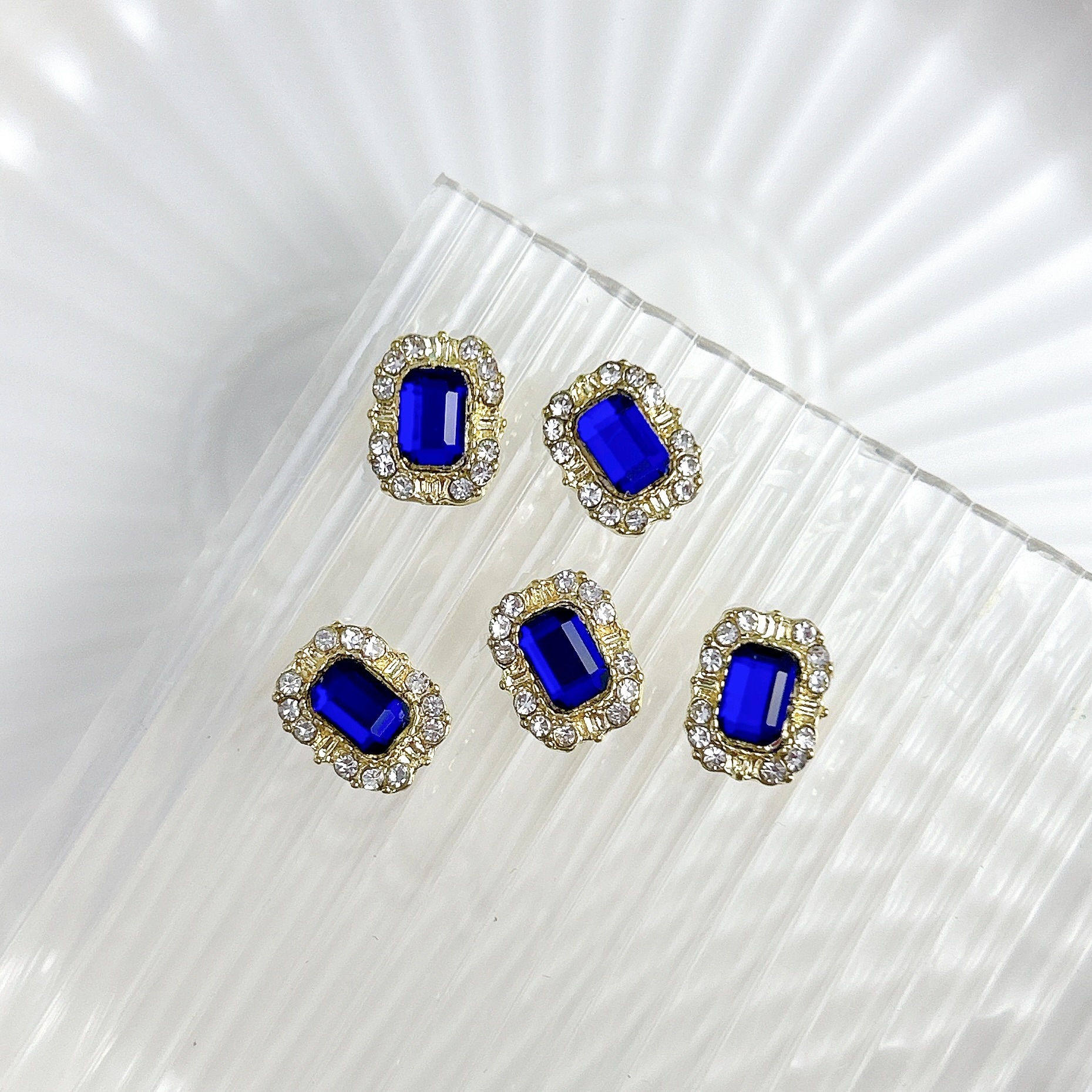 Nueva aleación china joyas de manicura taladro explosión grasa flash Fang amor gota de agua XiFeiYuan la misma armadura de la corte con taladro