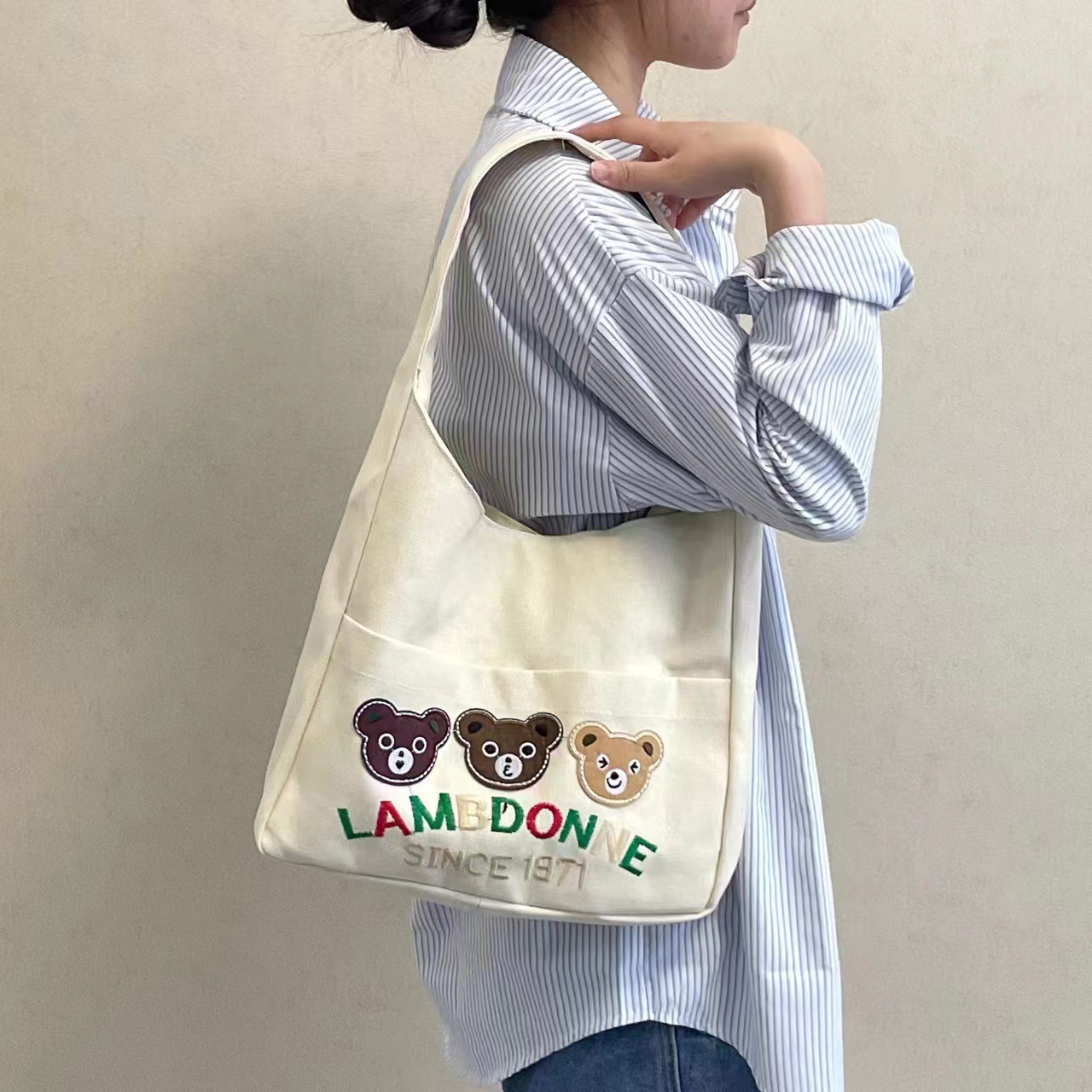 Travel canvas bag for women, single shoulder, 2023 new large-capacity student schoolbag, ins art Academy style cloth bag Item Picture