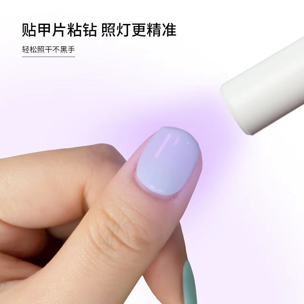Lámpara de uñas de mano pequeña lámpara de uñas portátil proyector de almacenamiento eléctrico mini lámpara de fototerapia de secado rápido lámpara de cocción de uñas