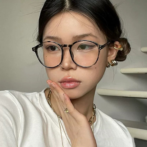 Round glasses frame with beige-colored rice grain design, suitable for natural makeup and large faces, unframed glasses, trendy for fashionable women and internet influencers.