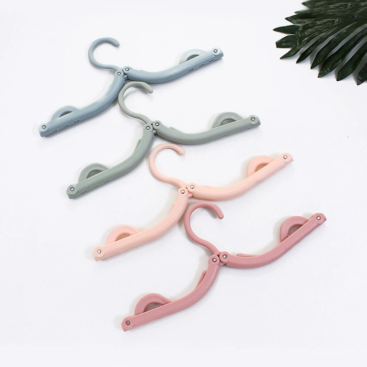 Handheld plastic universal hanger for traveling, non-slip simple drying rack