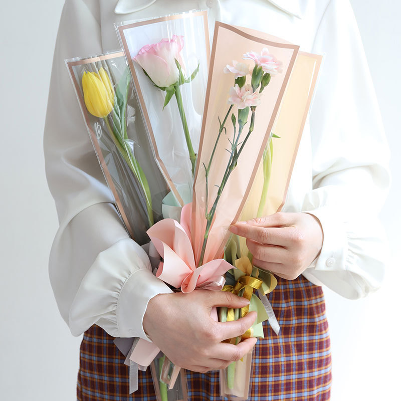 Huaxi Día de San Valentín Marco simple Bolsa de embalaje de flores Bolsa de tubo recto rosa Película opp Florería impermeable