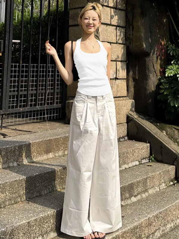 帆泰に頼ってレモンの黄色を修理して首のガーターのベストの女性の少女を掛けます。|undefined