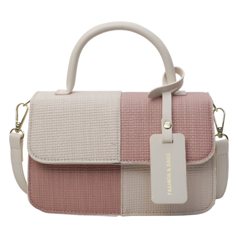 Bolso de mano coreano de contraste de color para mujeres 2024 primavera y verano nuevo bolso de moda universal bolso pequeño de nicho textura mochila