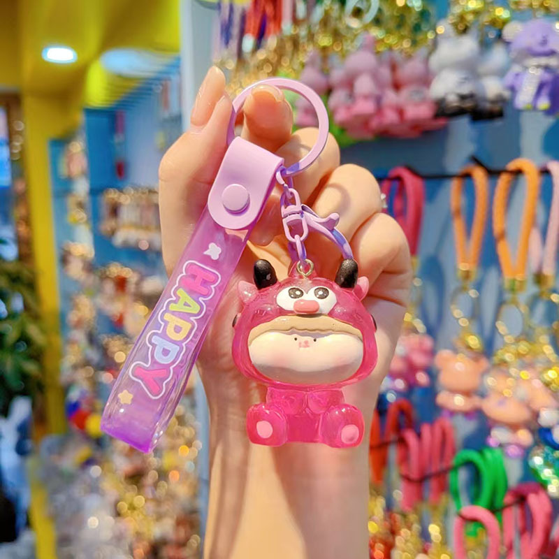 Caricatura Lilith dragón lindos colgantes de resina transparente bolsos de automóviles colgantes de llaves al por mayor