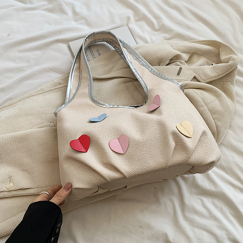 Bolsas de lienzo de nicho coreano para mujeres verano 2024 nueva moda bolsas de bolsa casuales, bolsas de brazo de la niña dulce